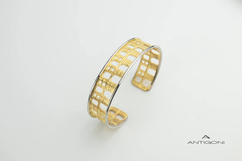 Fixed gold bracelet whose design faithfully depicts the trademark of Kavala, its imposing aqueduct