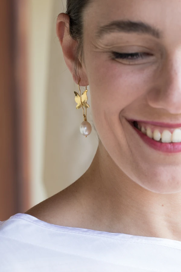 Butterfly earrings with pearls