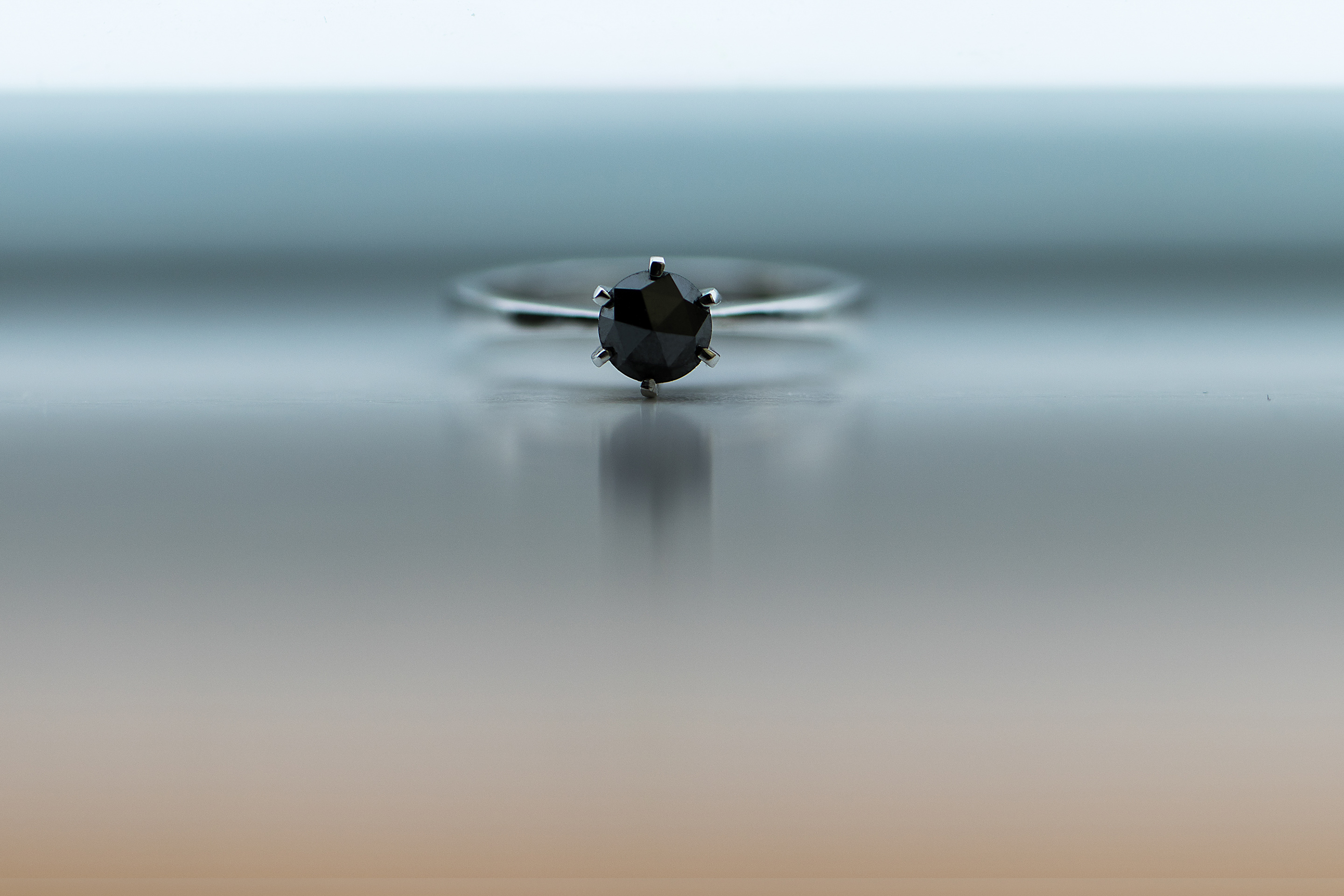 Solitaire ring with black diamond