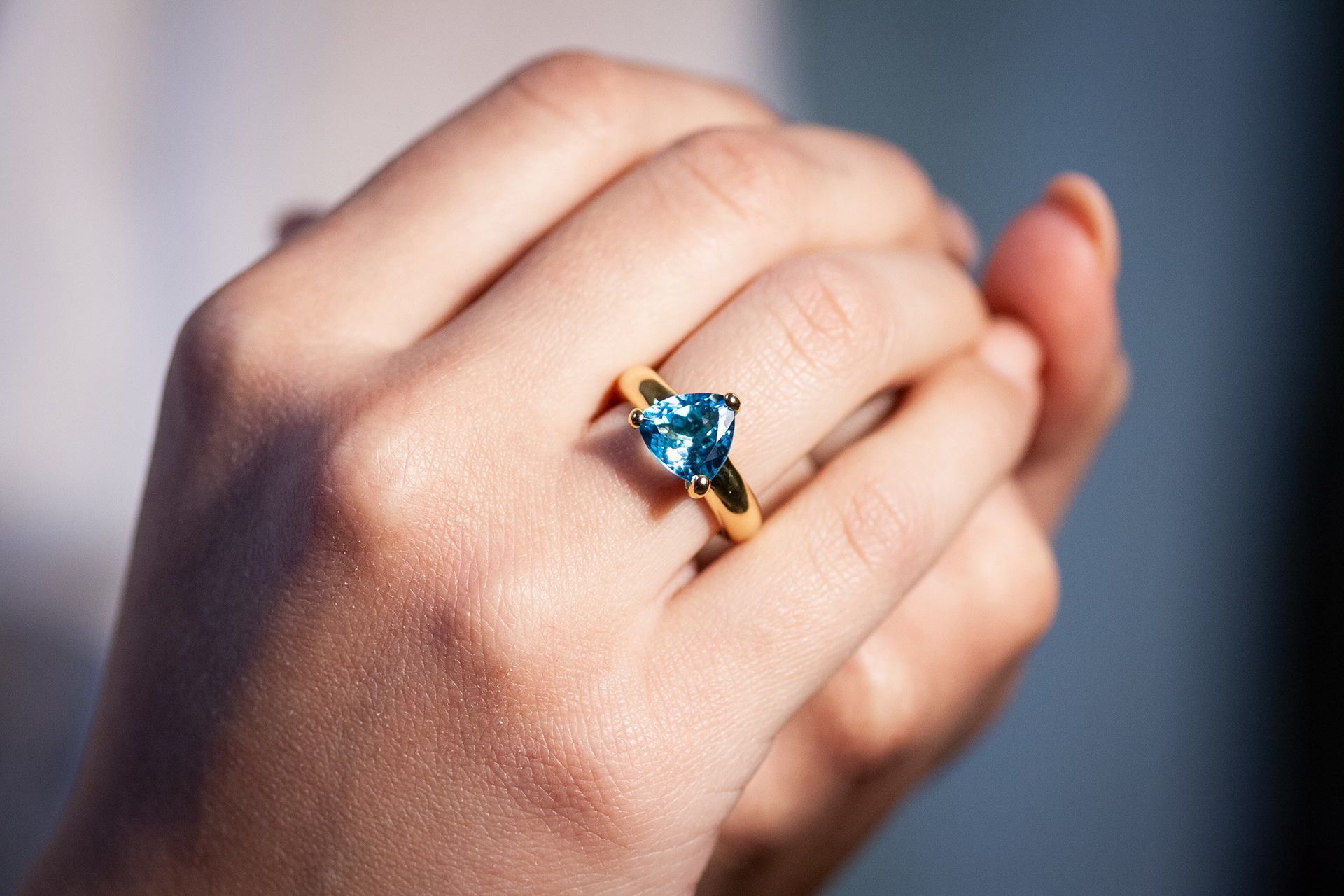 Solitaire ring with triangular stone