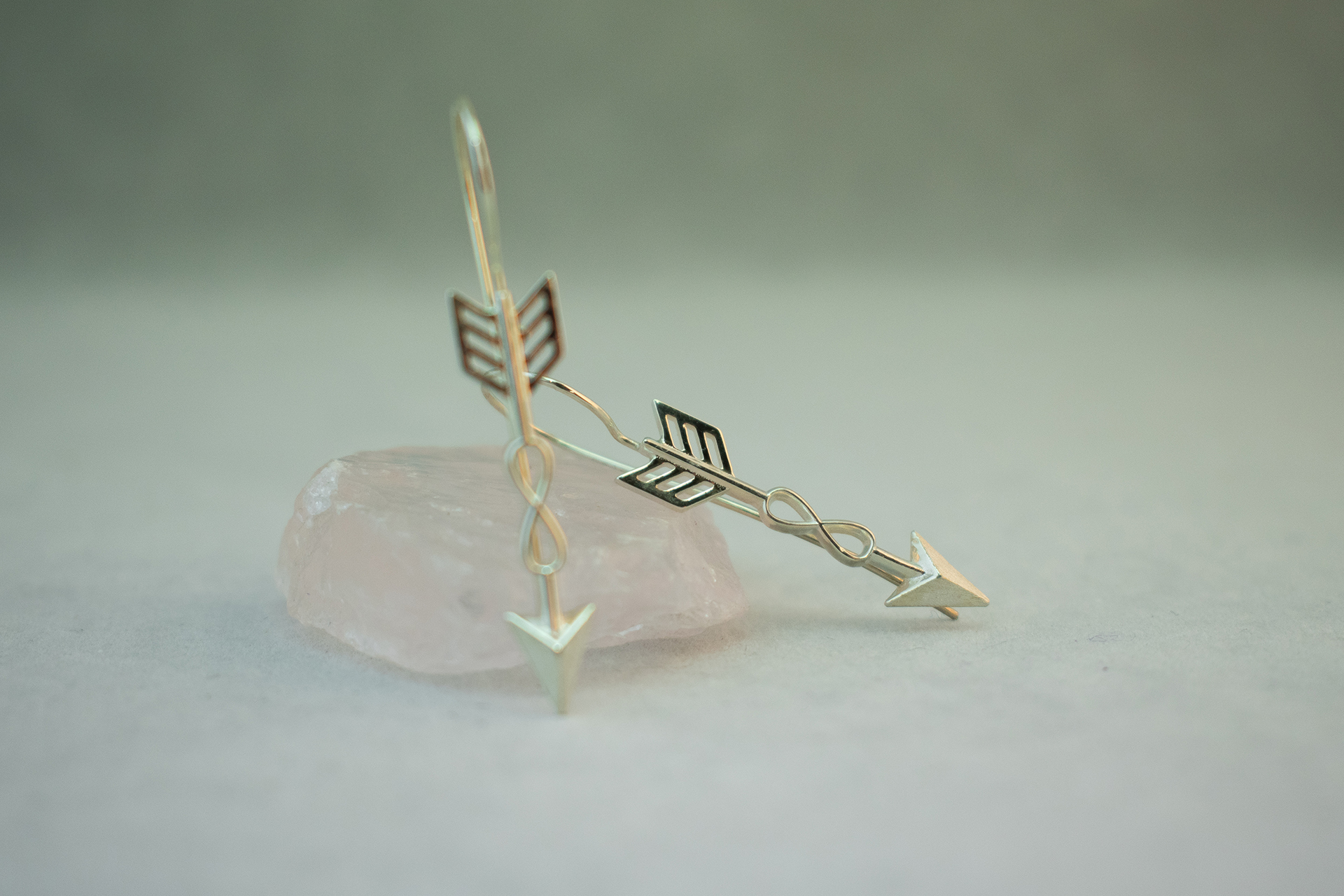 Pendant earrings with the arrow of love